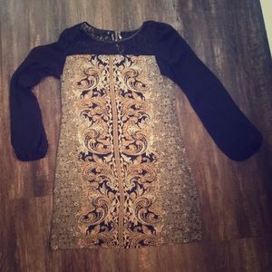 Long sleeve, sheer black sleeve dress. Never worn.